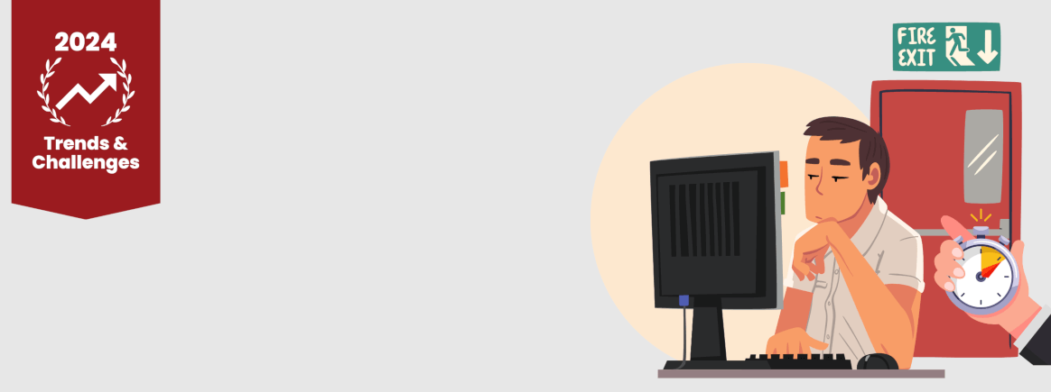 An employee sitting at a desk. A watch at the bottom right corner and a door, with an exit sign.